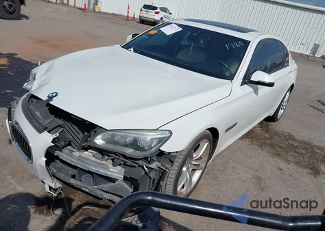 2015 BMW 750Li z USA, uszkodzony, nr VIN WBAYE8C52FD781788
